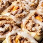 Peach Cobbler Cinnamon Rolls with Crumb Topping